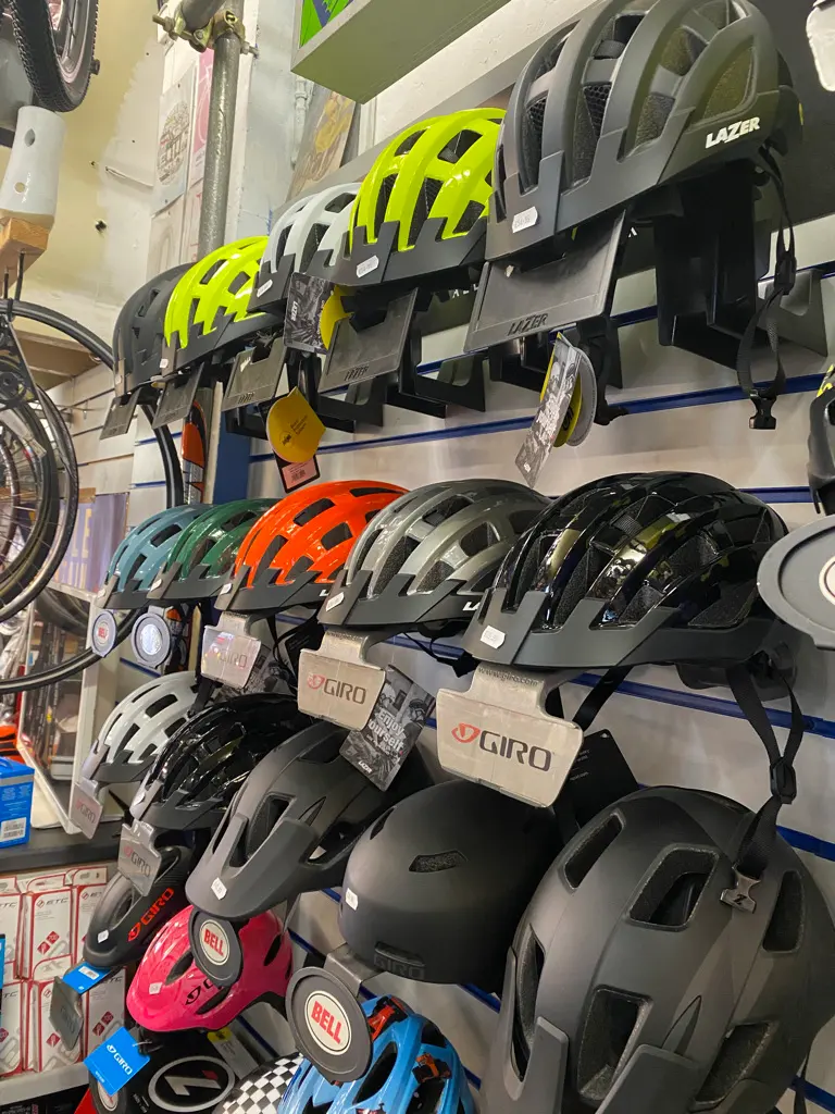 A wall of helmets in the shop