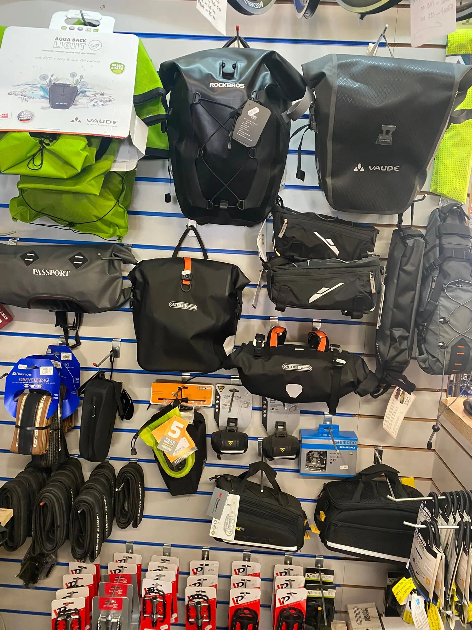 Ortlieb panniers and bike bags on the shop wall
