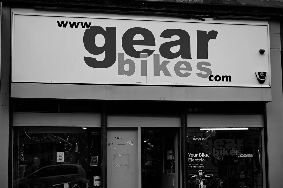 The Gear Bikes sign in black and white