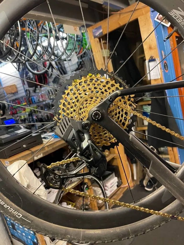 A cassette and rear derailleur in the workshop