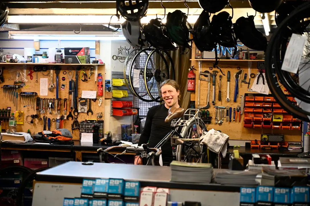 The workshop counter with tools on the wall