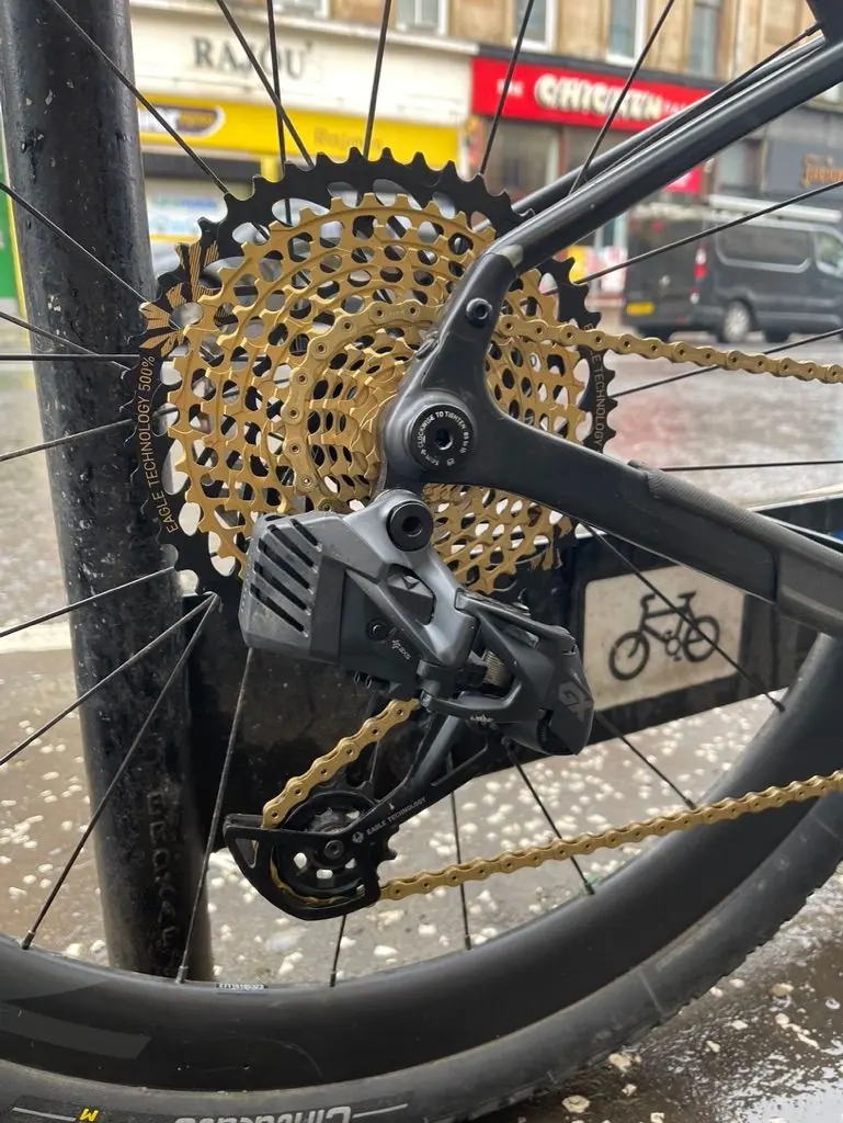 Close-up of an electronic rear derailleur and cassette on a road bike